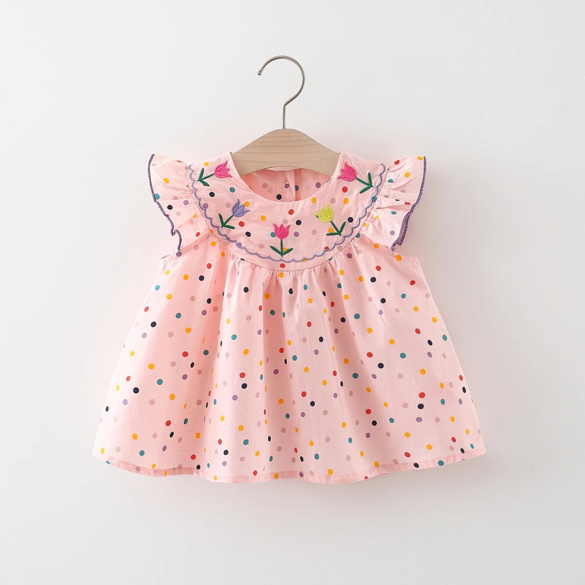 Vestido de niña con lunares y flores: ¡frescura y ternura en pequeños toques de color!