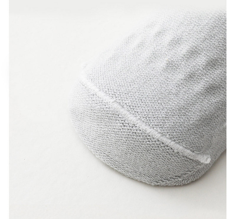 Ensemble chaussettes et genouillères : protection pour une meilleure découverte du monde