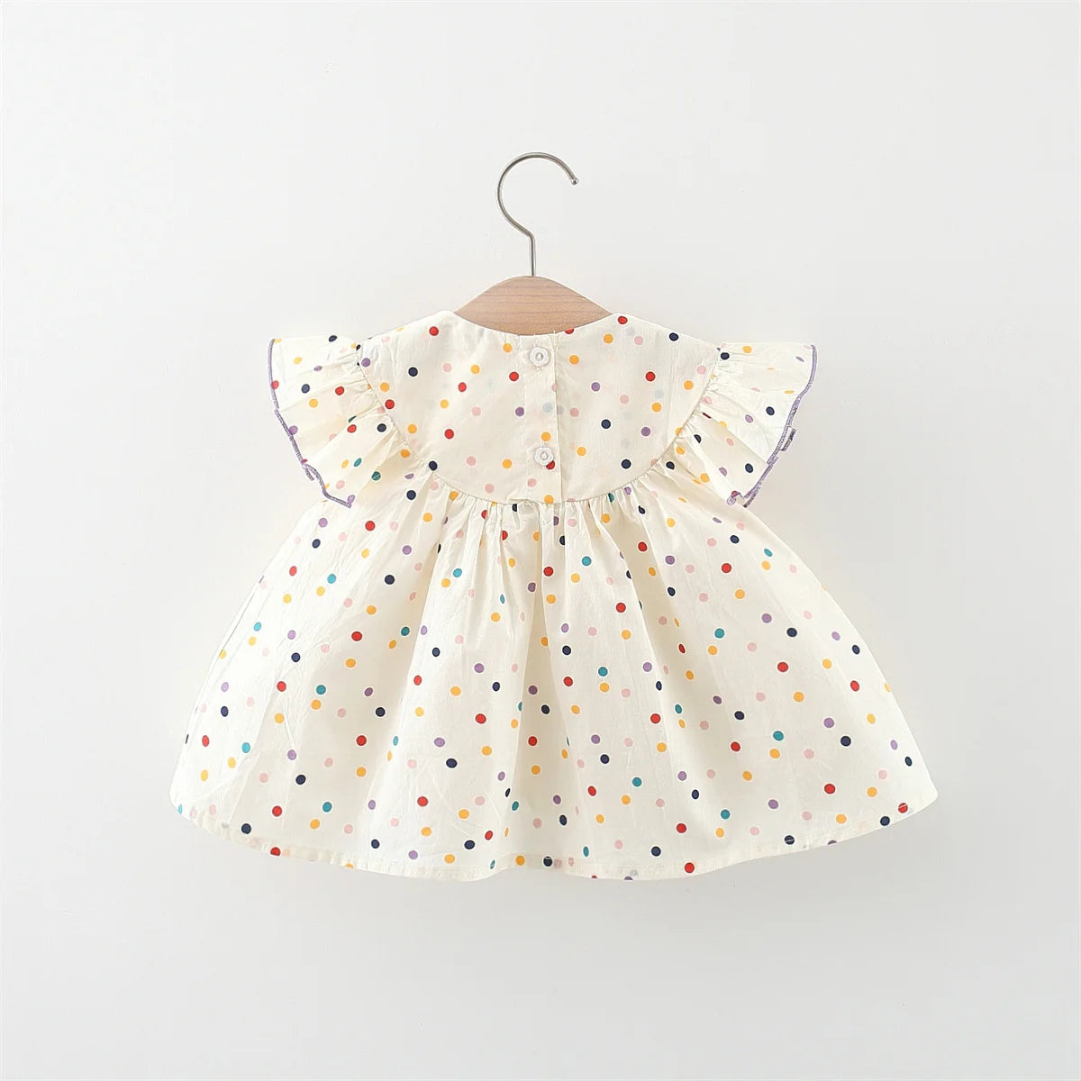 Vestido de niña con lunares y flores: ¡frescura y ternura en pequeños toques de color!