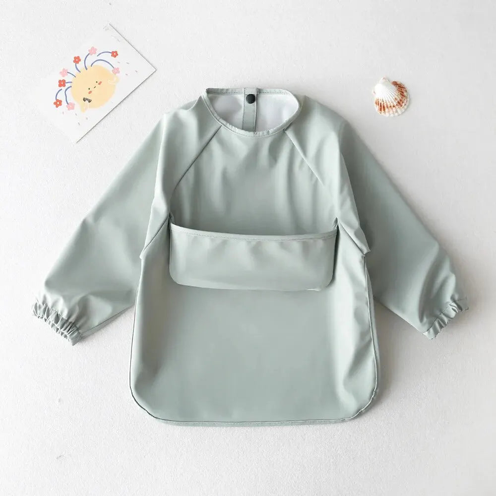 Delantal de alimentación impermeable de manga larga: ¡protege con estilo, crece en libertad!