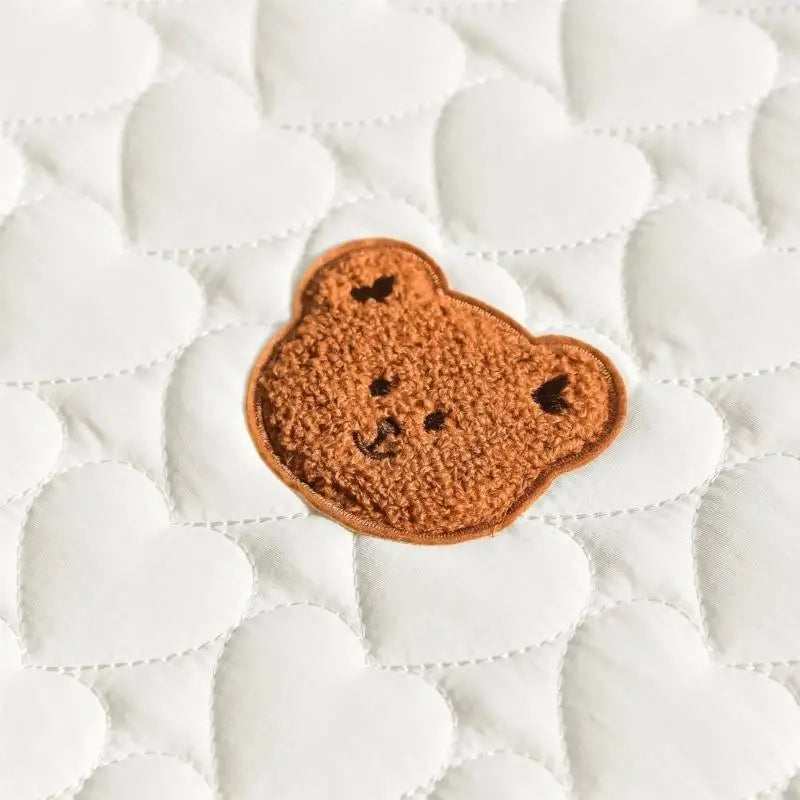 Tapis de sol "Nounours" pliable : le cocon nomade des petits aventuriers !