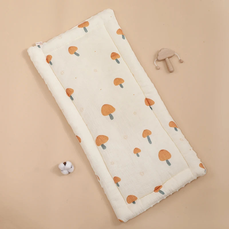 Colchón para cochecito: suavidad y ergonomía