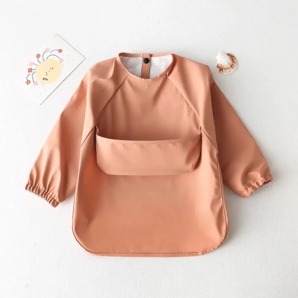 Delantal de alimentación impermeable de manga larga: ¡protege con estilo, crece en libertad!