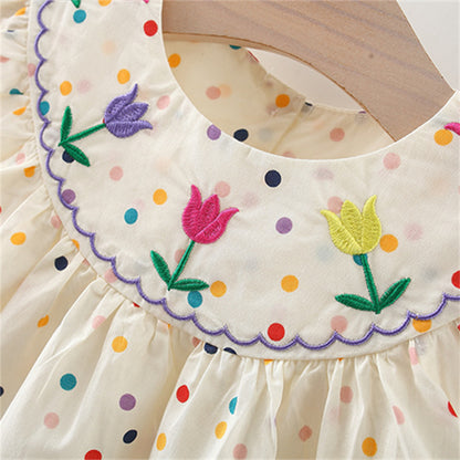 Vestido de niña con lunares y flores: ¡frescura y ternura en pequeños toques de color!