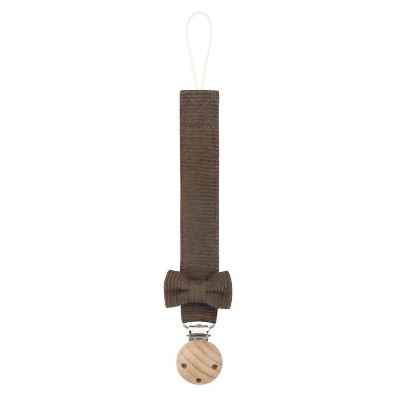 Attache tétine : l'élégance accrochée au sourire !